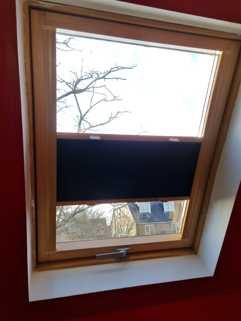 Blackout blind on a roof window, fitted by HomeDecisions